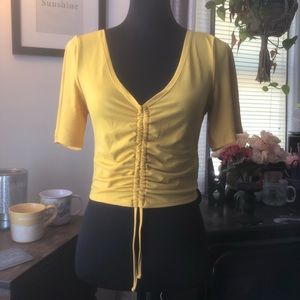 Divided Yellow Crop Top w/ Adjustable Ties
Size Small